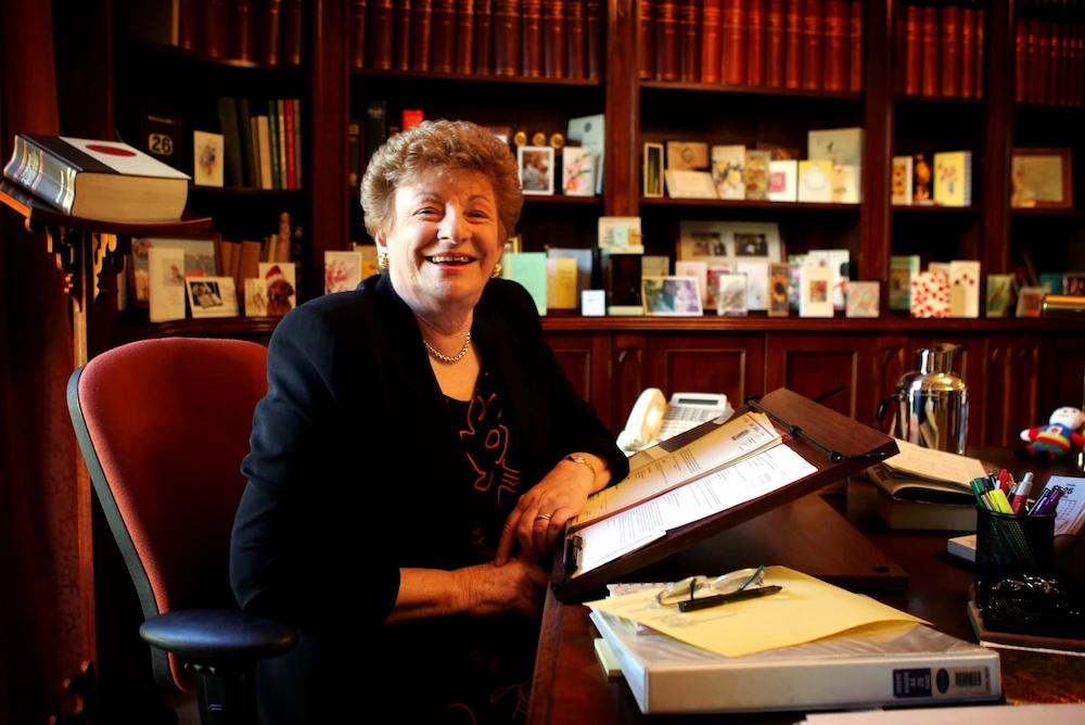 Photo of Marjorie Jackson-Nelson sitting at her desk